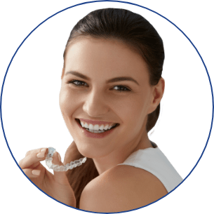woman smiling with clear aligner